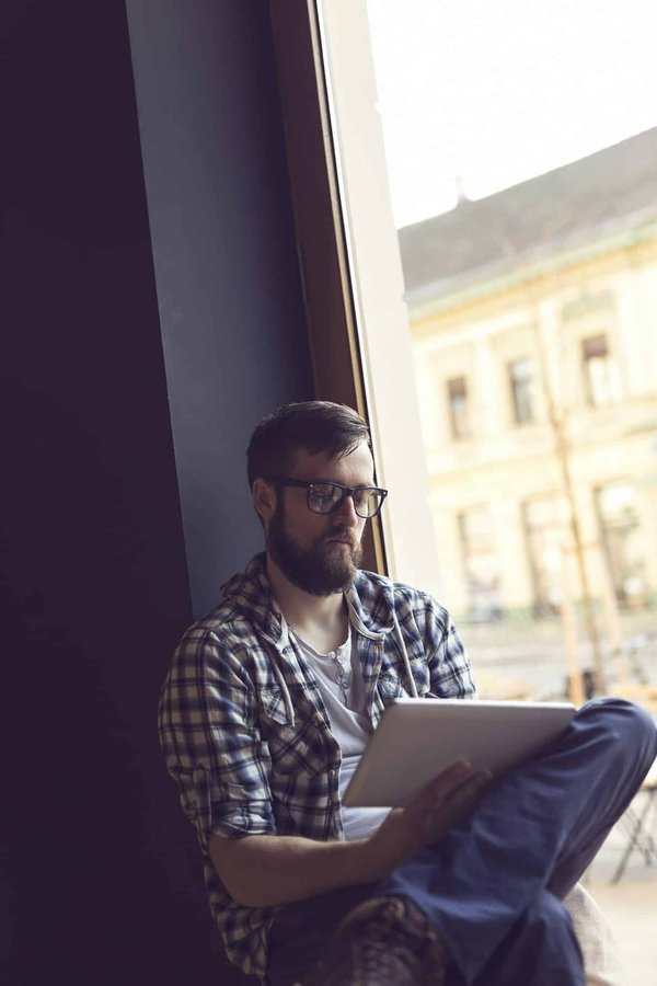 Where can you learn about the history of the British postal system through interactive exhibits?